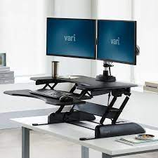 Enter the standing desk converter, a perfect medium between replacing your desk altogether and continuing your sedentary routine. Varidesk Pro Plus 36 Adjustable Height Desk Converters Vari