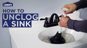 unclog a sink shower or tub drain