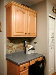 To do that, the crown's bottom edge has to be level and evenly spaced above the cabinet doors, and it has to remain intact. Mini Makeover Crown Molding On My Kitchen Cabinets How To Nest For Less