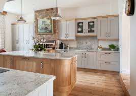 They have a distinctive pale gold color stain that can coordinate with any color stain present in a kitchen space. Natural Oak Cabinets Kitchen Farmhouse With Shaker Style Square Wall And Floor Tiles