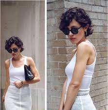 For this look, the hair is quite short and the section on top is longer and very curly. Short Curly Pixie Haircuts