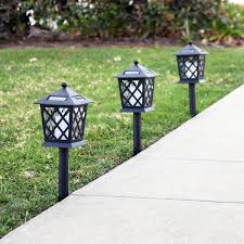 Alpine Corporation Set Of 4 Outdoor Solar Powered Pathway Led Light Stakes Black