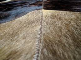 cow hide round rugs