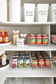 organize canned goods in cabinets