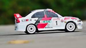GT24 Lancer EVO4 | New Product Announcement: Item: 86868 GT24 Mitsubishi  Lancer Evolution 4 WRC RTR Carisma Gets It's Group A Groove On! Continuing  the expansion of the... | By Carisma | Facebook