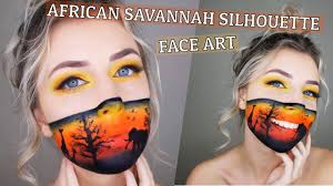 african savannah silhouette face art