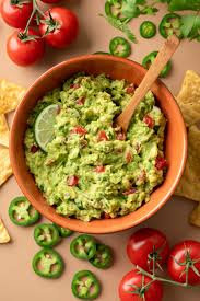 chunky guacamole with tomato and