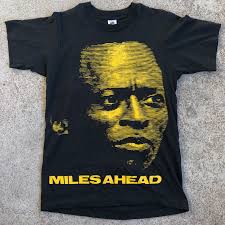 If you notice, the black shirt has the background removed so the image blends into the shirt, the others have the background in the photo of miles. Vintage Miles Davis Tee Men S Medium Depop