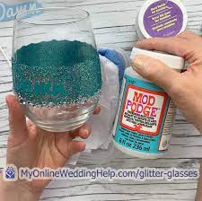 These diy painted wine glasses are super easy to make, they look amazing, and they're dishwasher safe! Diy Personalized Glitter Wine Glasses 5 Steps My Online Wedding Help Wedding Planning Tips Tools