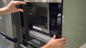 fix a loose or broken microwave door