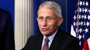 Anthony fauci listens as president donald trump speaks during a coronavirus task force briefing at the white house. Why Coronavirus Expert Dr Anthony Fauci Is The Voice Americans Trust