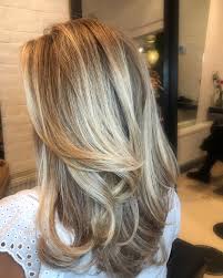 You can wear medium length hairstyles in a number of ways, in a variety of shapes and styles including straight, wavy or curly. 49 Stunning Brown Hair With Highlights Ideas For 2021