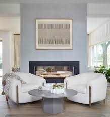 Pair Of Chairs Flanking Fireplace