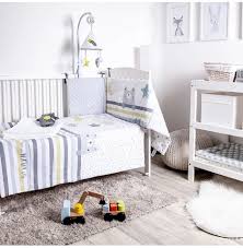 grey and white cot bed bedding