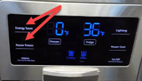 Where is the reset button on a Samsung side by side refrigerator?