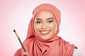 muslim woman with makeup brush