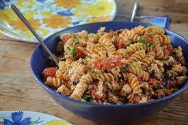 This recipe is one of those 5 ingredients or less kind and comes together quickly. Stylish Cuisine Tomato Feta Pasta Salad Flexitarian Recipes Best Salad Recipes Best Pasta Salad