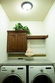 A simple attractive way to do this would be to build 3, small short walls, one on the right againt the walls that's there. How To Install Countertop Above Washer And Dryer Best Tips And Tricks