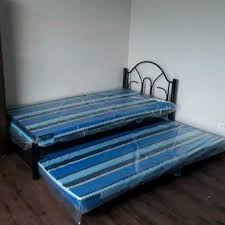 In our wide selection of single beds and single bed frames you can find anything from classical to spartan or more practical ones with built in storage that make even better use of your space. Single Bed With Pullout With Uratex Foam 48x30x75 Furniture Home Living Furniture Bed Frames Mattresses On Carousell