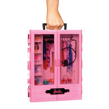 The pink closet is decorated with clear double doors for a glimpse into barbie. Barbie Fashionistas Ultimate Closet Smyths Toys Uk