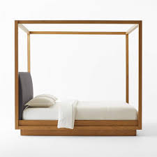 wood canopy king bed