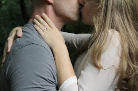 man and woman kissing free stock photo