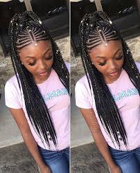 This black hairstyle comes with shallow bangs that fall across the forehead in cute strands and come down to half cover one eye for a teasing look. Caringfornaturalhair For All Things Natural Hair Care Naturalhair Hairdo For Long Hair African Hair Braiding Styles Braided Hairstyles