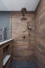 Brass Fixtures Wood Tile Bathroom