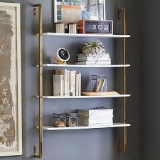 White And Brass Mounted Shelves