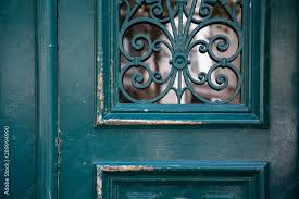 Old Wooden Door Curved Ornate Gratings