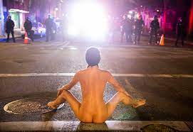 Naked Athena': The story behind the surreal photos of Portland protester 