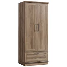 Armoires and wardrobes often have hanging spaces, sliding shelves and drawers. Pemberly Row Armoire Wardrobe Closet With Hanging Rod In Coffee Oak Furniture Bedroom Furniture Emosens Fr