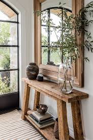 As a general rule, you don't want to place a sofa in front of a door because you don't want to block it, and you don't want people to walk into the back of the sofa. 10 Tips For Decorating Your Entryway Console Table Like A Pro Decoholic