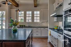 kitchen cabinets in antique white with