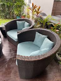 large outdoor chairs with cushions and