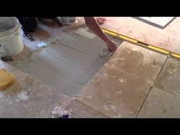 how to install travertine floor tile
