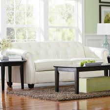 502551 off white bonded leather sofa by