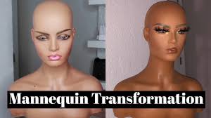 practicing makeup on a mannequin head