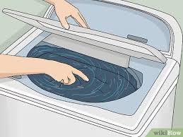 A washer has a tub and an agitator; 3 Ways To Fix A Shaking Washing Machine Wikihow