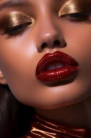 red lip and gold eye shadow