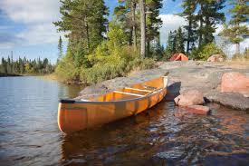 how much weight can a canoe hold with