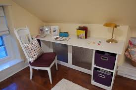 When you need a desktop work area, but don't have the room, this computer desk offers the perfect alternative. White Desk And Chair In Sloped Corner Of Teen Bedroom Hgtv