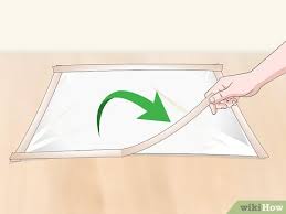 I was taught to stretch paper with masonite and butcher tape, which always ended up as an exercise in frustration for me i use a staples stapler. 3 Ways To Stretch Watercolor Paper Wikihow
