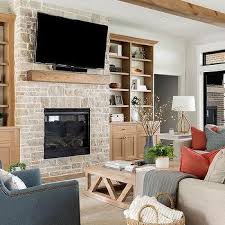 Red Brick Fireplace With Wood Mantel