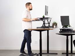 Sitting at your desk researchers say standing burns more calories than sitting, but the amount of benefits from working on your feet varies from. Switch Between Standing And Sitting Easily With The Vivo Standing Desk Spy
