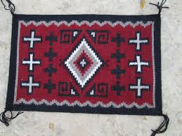 a two faced navajo weaving by gilbert be