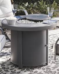 With walmart's selection of fire pit tables, staying warm and spending quality time with friends and family outdoors has never been more fun, easy and safe. Donnalee Bay Round Fire Pit Table P325 776 Fire Pits Star Furniture