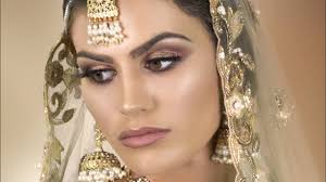 red and gold asian bridal makeup you