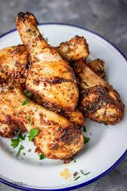 Line two large shallow baking pans with foil and grease; Easy Baked Chicken Drumsticks The Dinner Bite