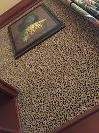 leopard print fabric used as a wall